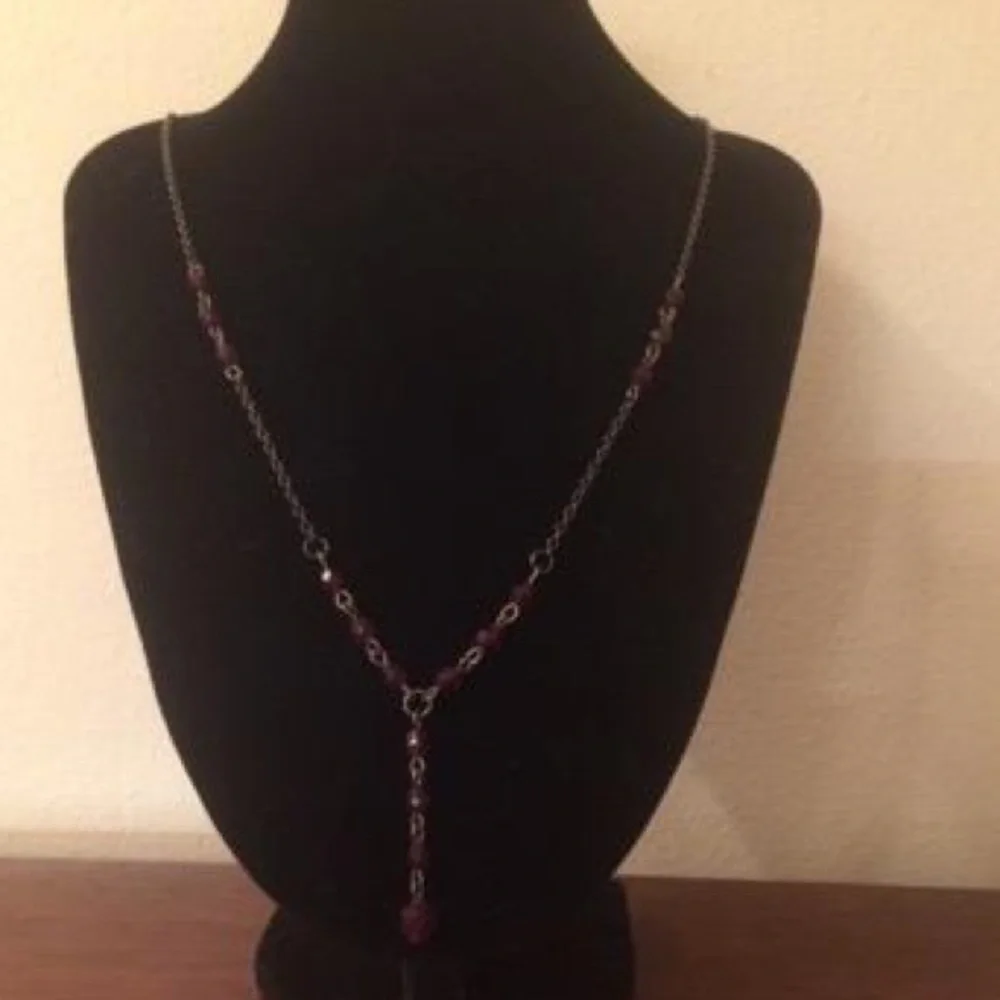 Red and golden beaded necklace.